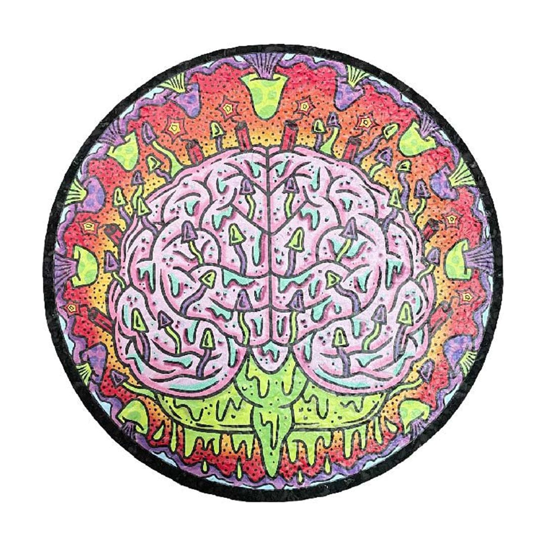 Overhead view of the 10" Dab Mats with a colorful, psychedelic design featuring swirling patterns and vibrant hues.