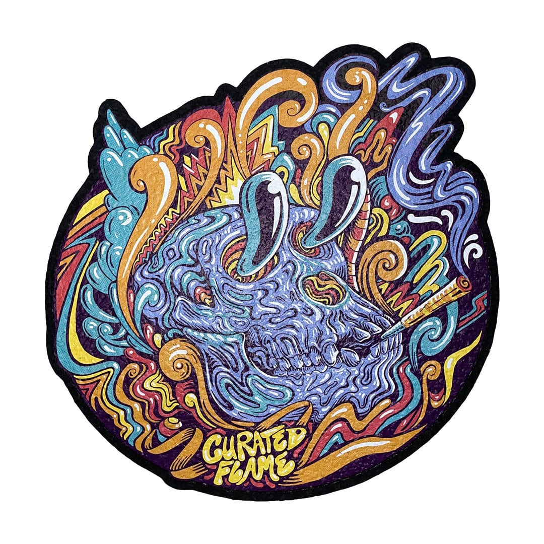 A vibrant, overhead view of the 10" Dab Mats displaying an abstract, swirling pattern of colorful paint-like textures.