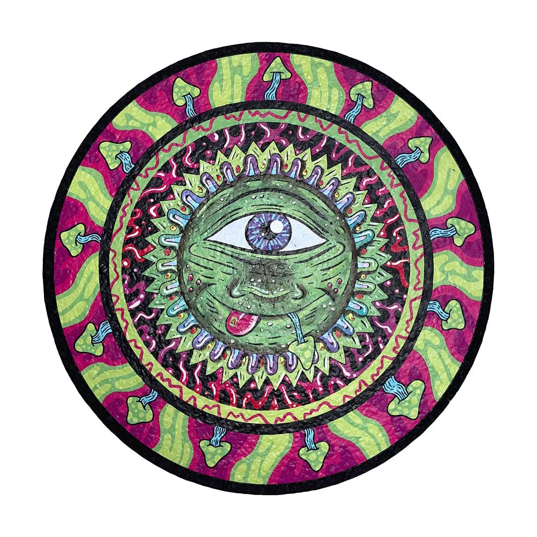 A top-down view of the 10" Dab Mats, showcasing a vibrant, circular design with psychedelic patterns and mushroom illustrations.