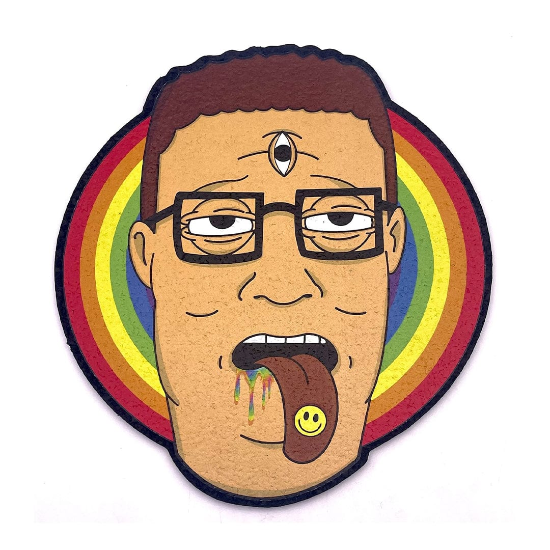 A close-up, front view of the "11" Dab Mats featuring a cartoon face with an extended tongue against a vibrant, rainbow-colored background.