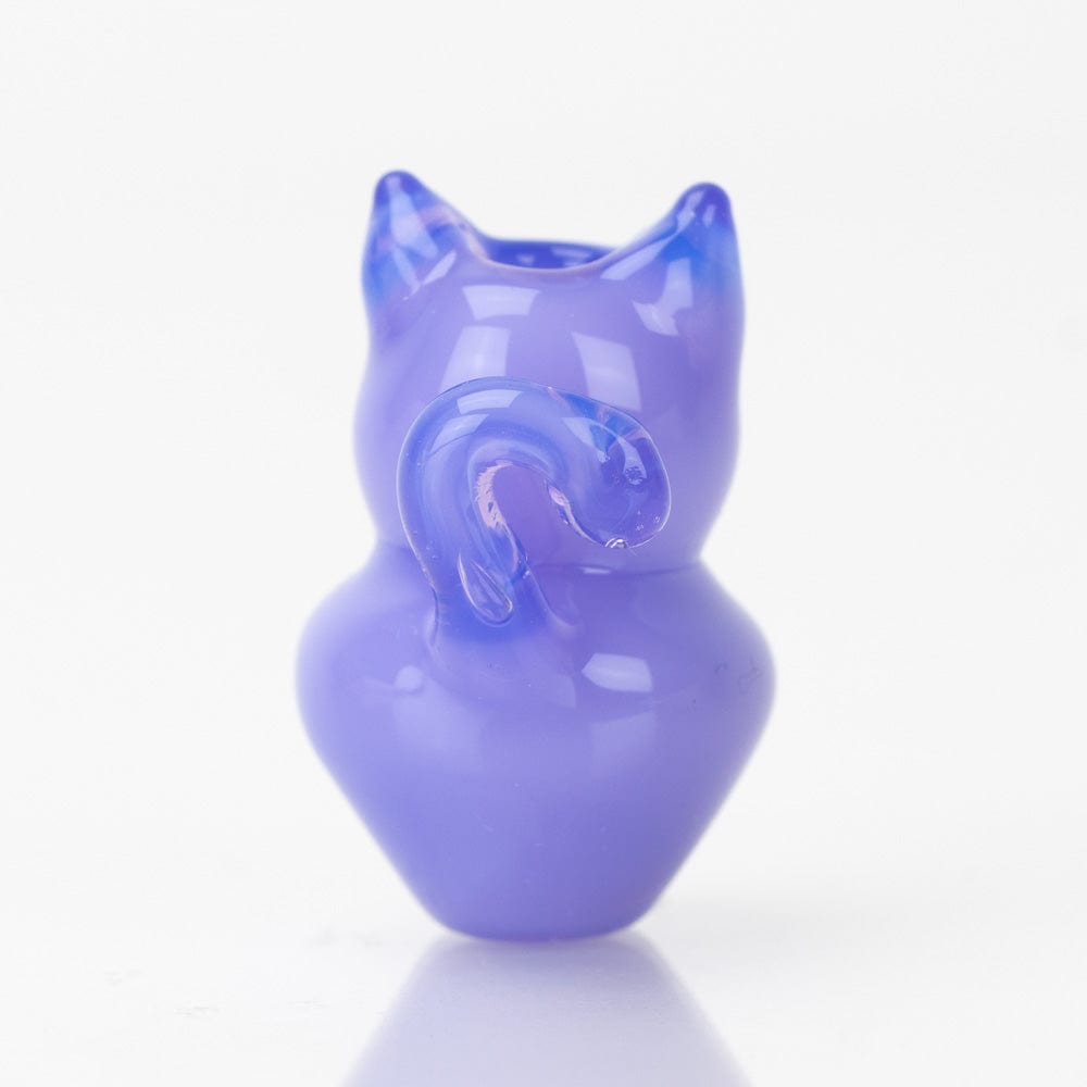 A studio shot displays the SakiBomb Kitty Carb Cap, showcasing its smooth, colorful glass design against a clean white surface.