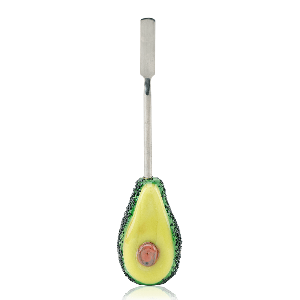 A close-up shot of the Avocadope Dabber with a green, avocado-shaped ceramic tip and silver metal shaft on a white surface.