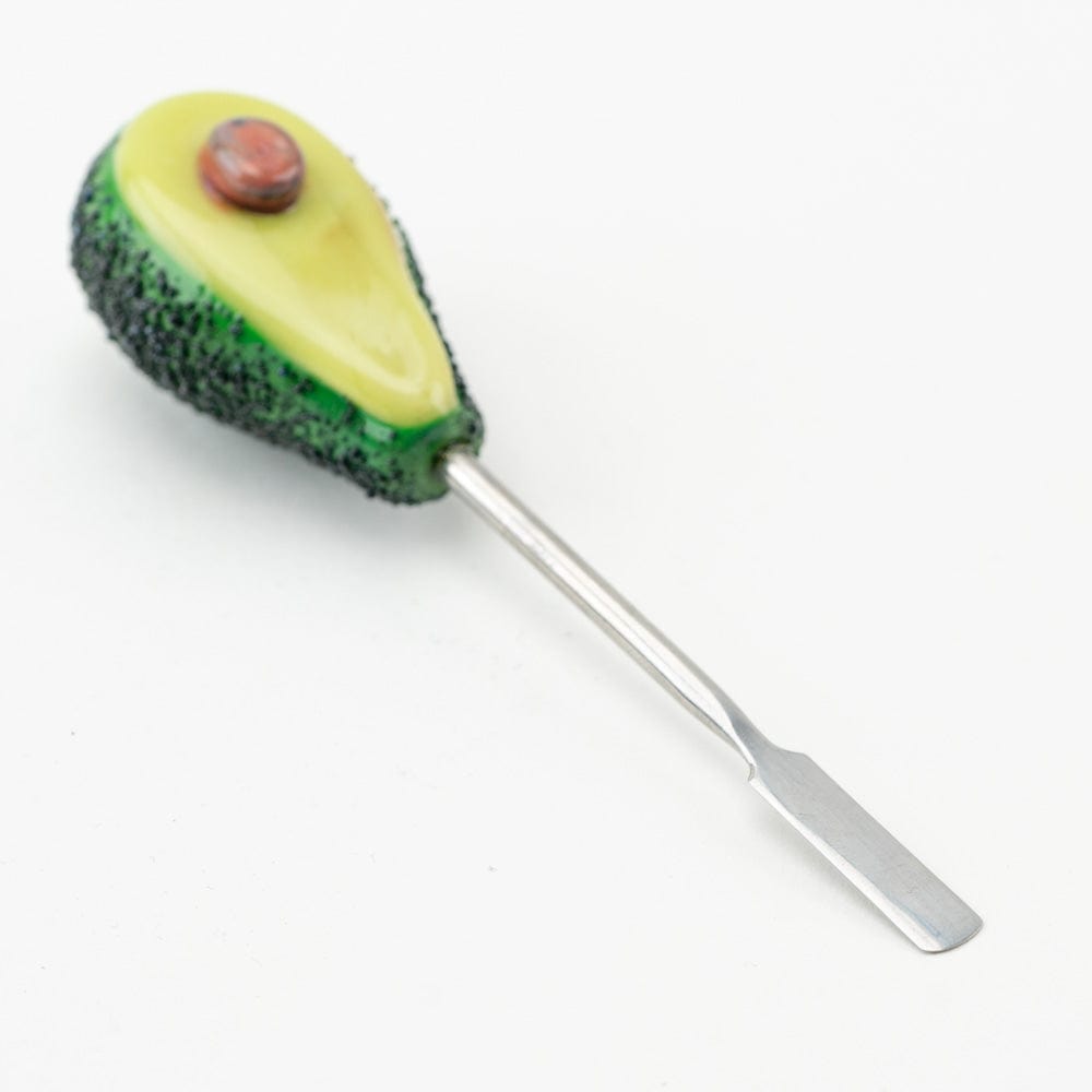Close-up shot of the Avocadope Dabber with a metallic tip extending from a green, textured handle against a white background.