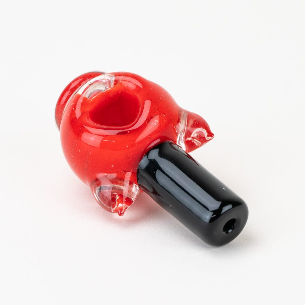 A close-up, angled view of the SakiBomb Kitty Red Nail Polish Dry Pipe, showcasing its red glass construction.