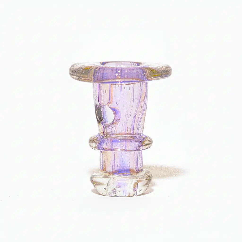 Centered studio shot of the Empire Glassworks PuffCo 'New Peak' & Proxy Glass Joystick Cap - Eclipse showing its translucent purple-tinted glass cylinder with flared top and ringed middle.