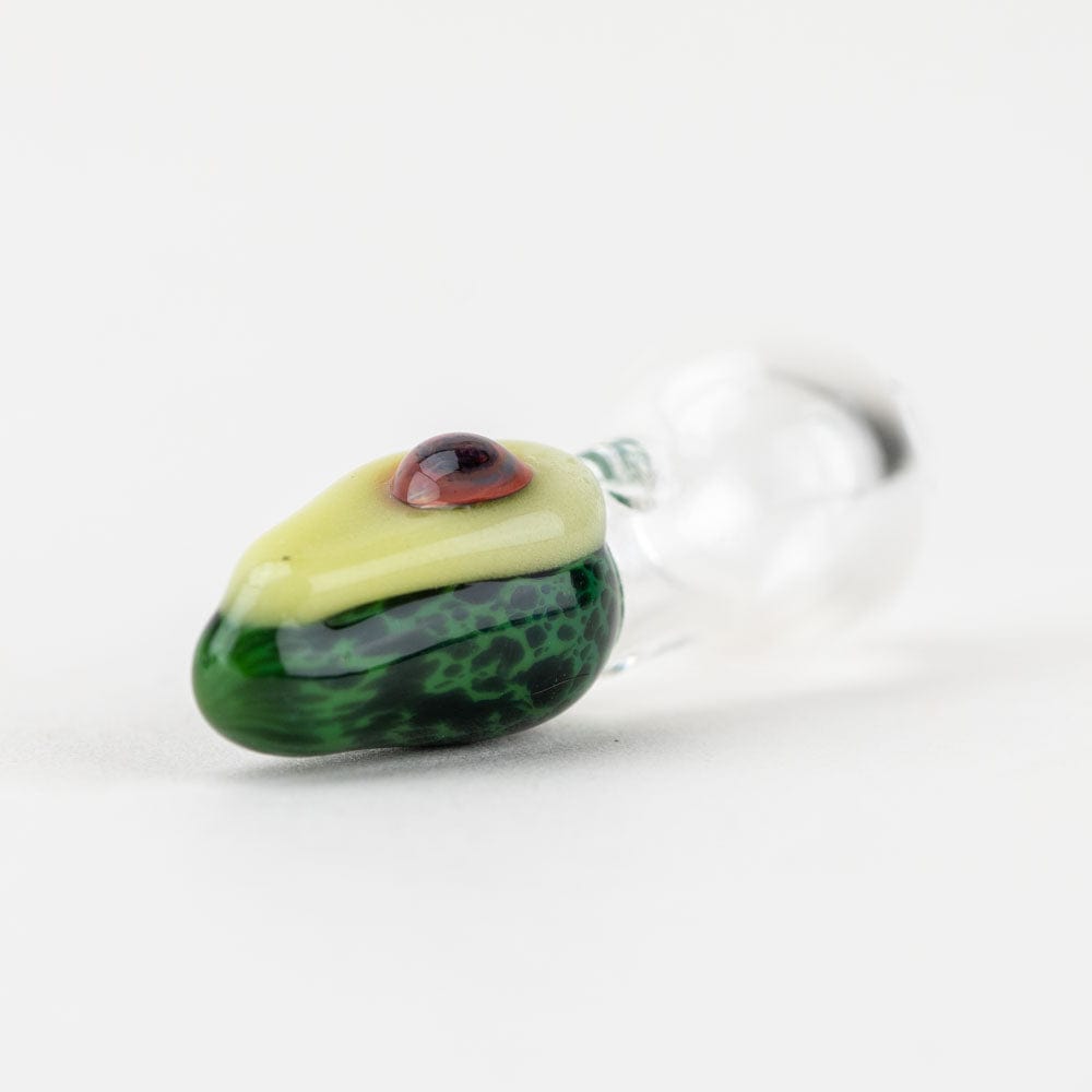 Close-up, angled view of the Avocadope PuffCo Peak Pro Glass Ball Cap, showing its rounded green and translucent form.