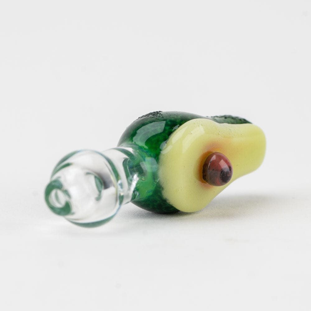 A close-up, angled view of the Avocadope PuffCo Proxy Glass Ball Cap, showcasing its rounded shape and vibrant coloring.