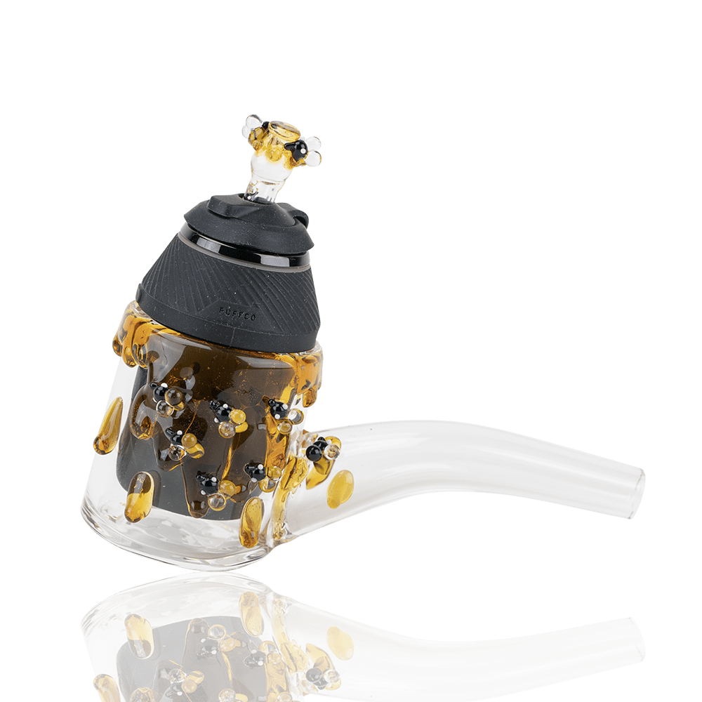 A close-up shot of the Beehive Proxy Glass Attachment Set, showcasing its clear glass construction and honeycomb-like texture.