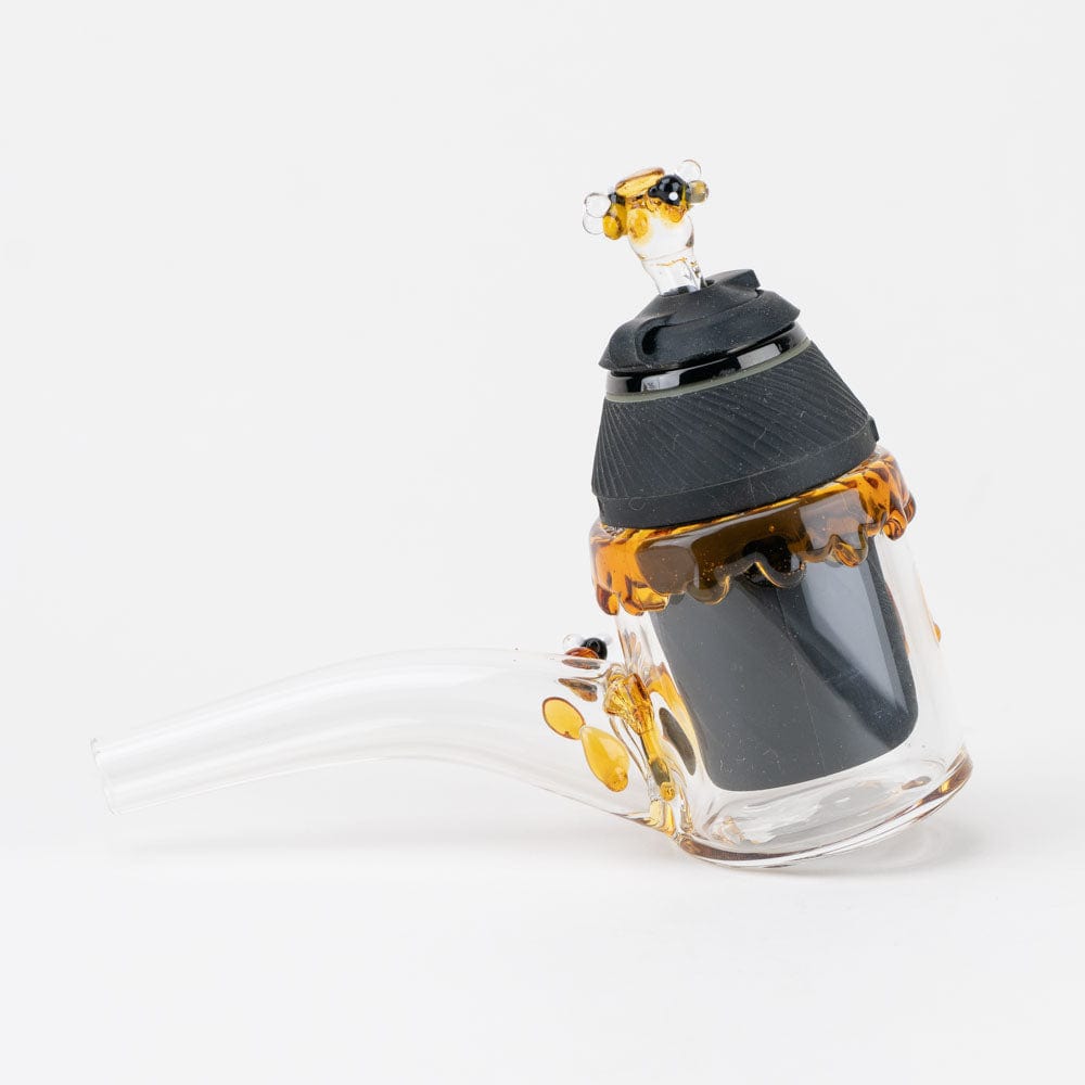 A slightly angled view of the Beehive Proxy Glass Attachment Set, featuring a clear glass piece with honeycomb-like detailing.