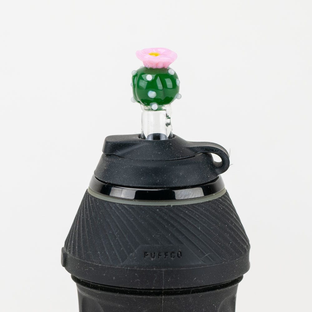 A close-up of the Cactus PuffCo Proxy Glass Attachment Set, showing the green cactus-shaped glass piece.
