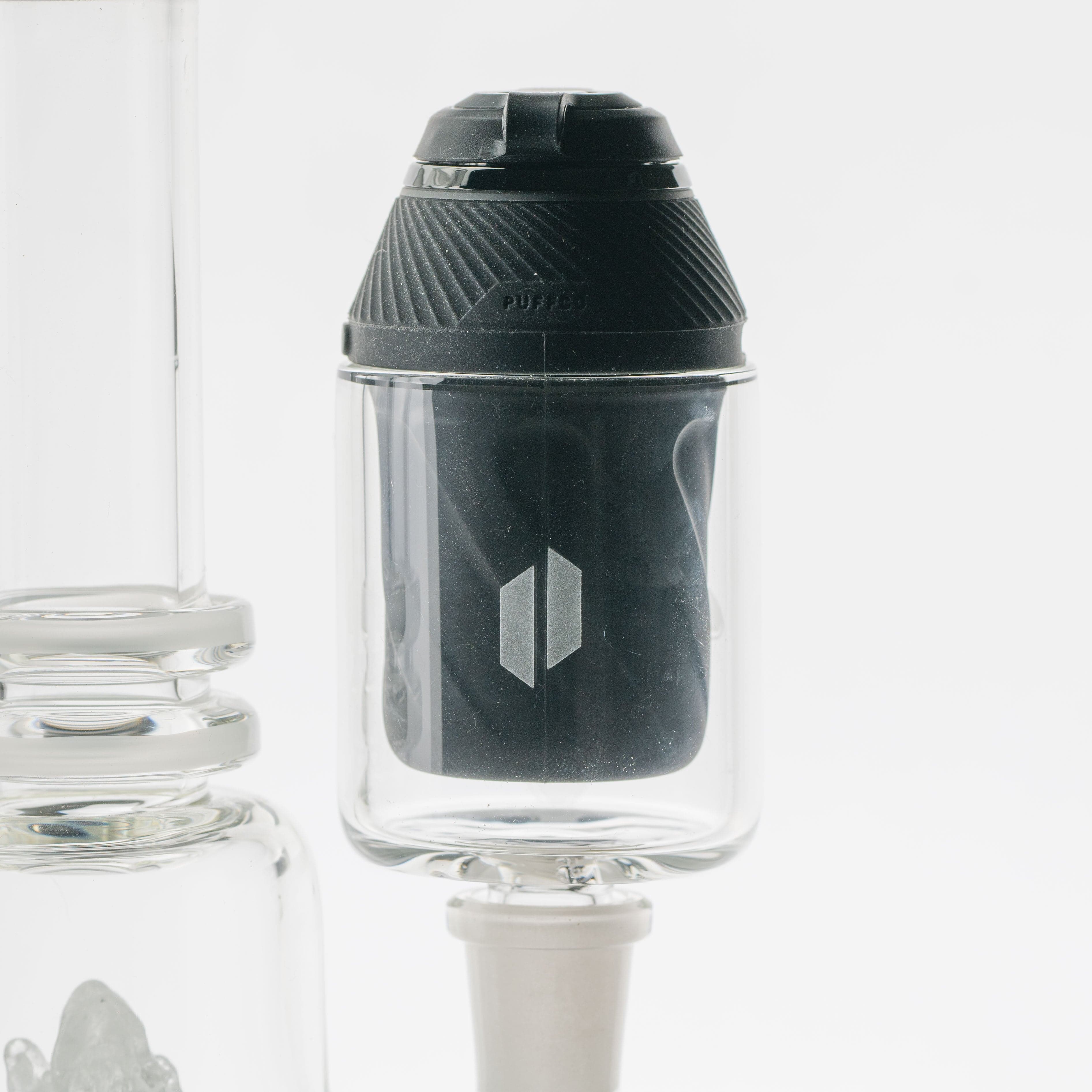Front view of the Frosty Lotus Puffco Proxy Glass Attachment, displaying a clear glass build and unique floral shape.