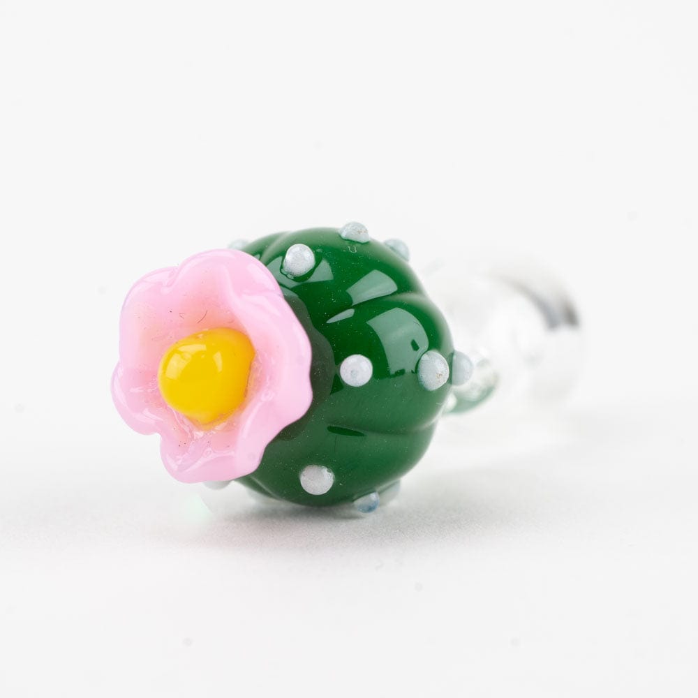 A close-up shows the Peyote PuffCo Proxy Glass Ball Cap with a pink, floral-like design against a plain white background.