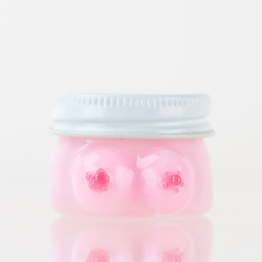 A close-up view of the Boobies Terp Jar, showcasing its playful, sculptural design against a plain white background.