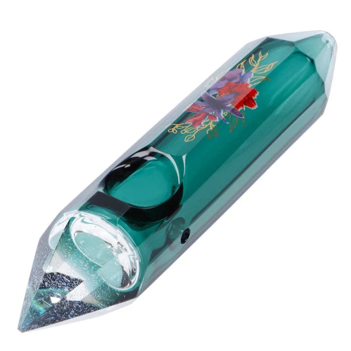 A diagonal view of the Floral Lush Crystal Hand Pipe, showcasing its clear glass construction with floral accents.