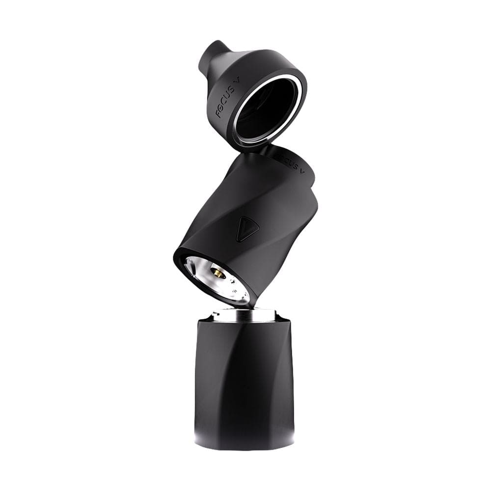 A close-up, angled view of the AERIS Vaporizer, showcasing its smooth, silver exterior and compact cylindrical design.