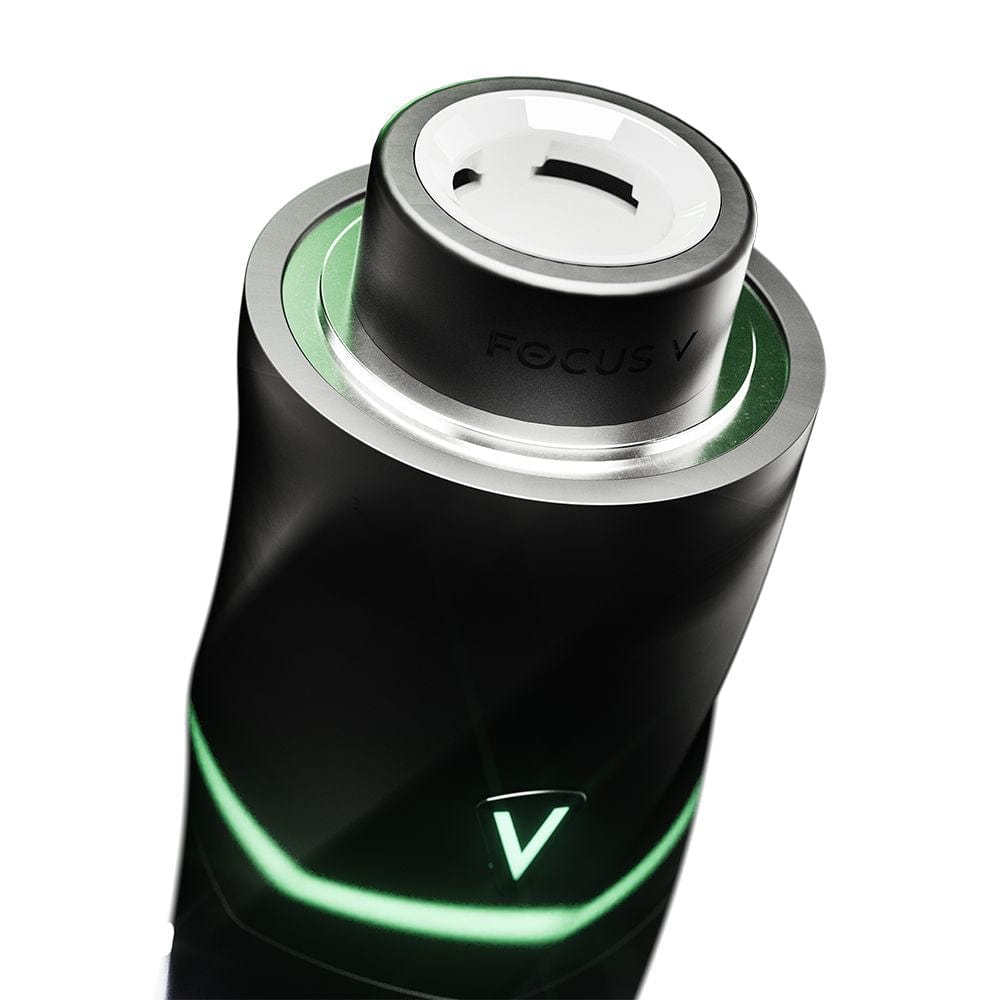 A close-up, angled view of the AERIS Vaporizer, showcasing its sleek, dark finish and cylindrical shape.