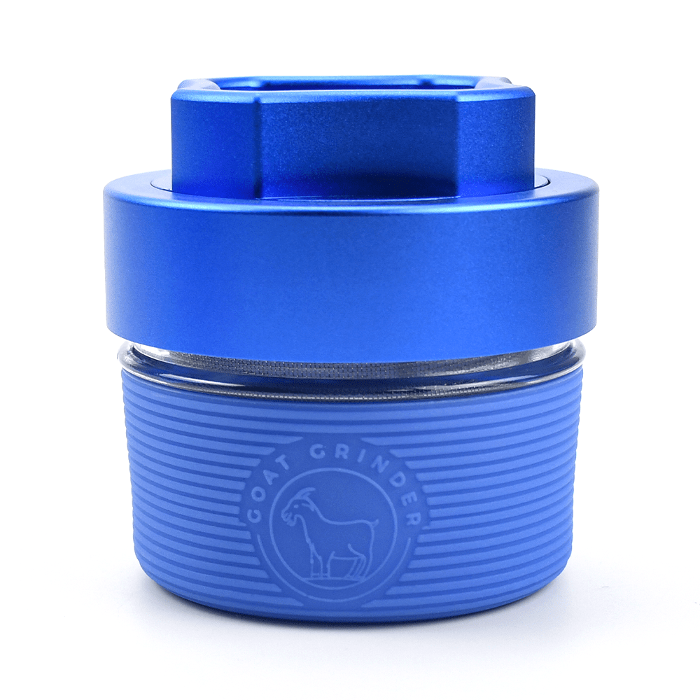 Front view of the AITH v.I – OG Grinder Jar, a blue, cylindrical container with a tight-fitting lid.