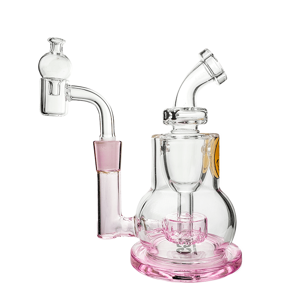A three-quarter view of The Chief Mini Rig 4-Piece Kit, showcasing the clear glass rig with a simple, rounded design.