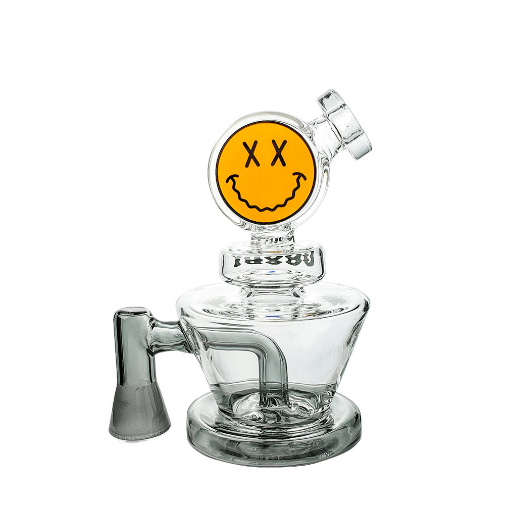 Front view of the Big Face VR Vape Rig, showcasing a clear glass rig with a patterned face design and a rounded base.