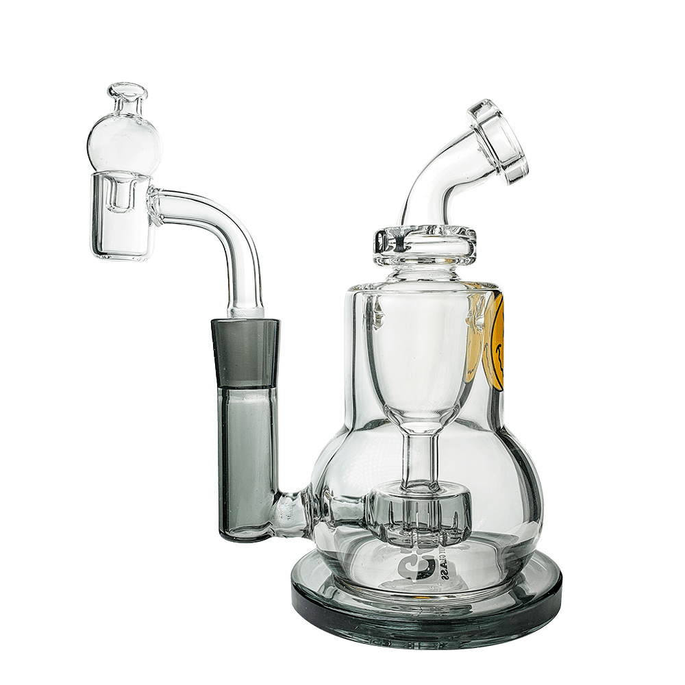 A three-quarter view of The Chief Mini Rig 4-Piece Kit, showcasing its clear glass construction and compact size.