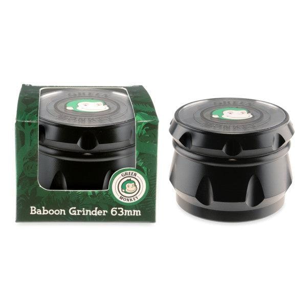 A close-up of the Baboon Crown 63mm Grinder, showcasing its circular design and metallic finish.
