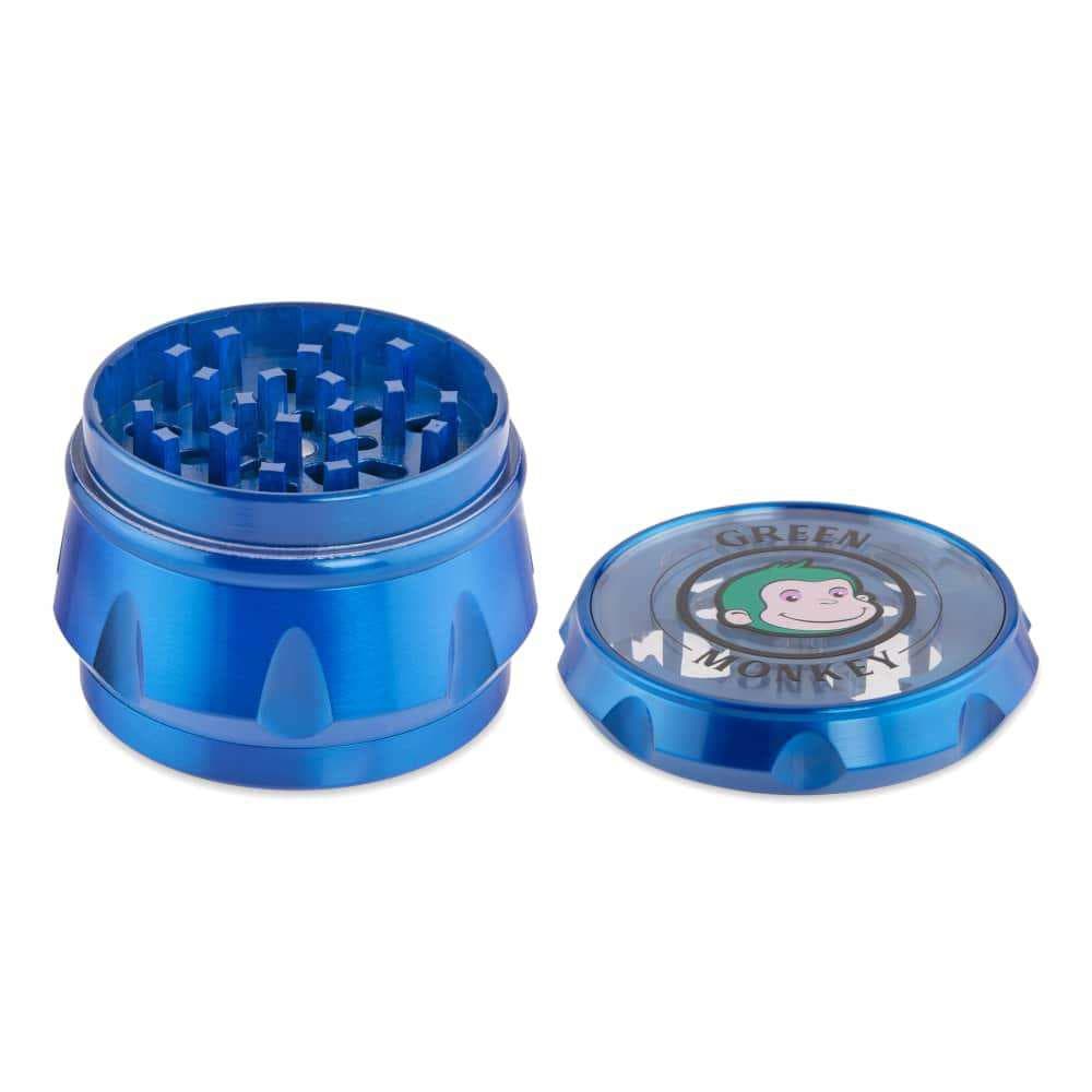 Front view of the Baboon Crown 63mm Grinder, a silver metal grinder with a textured grip and visible grinding teeth.