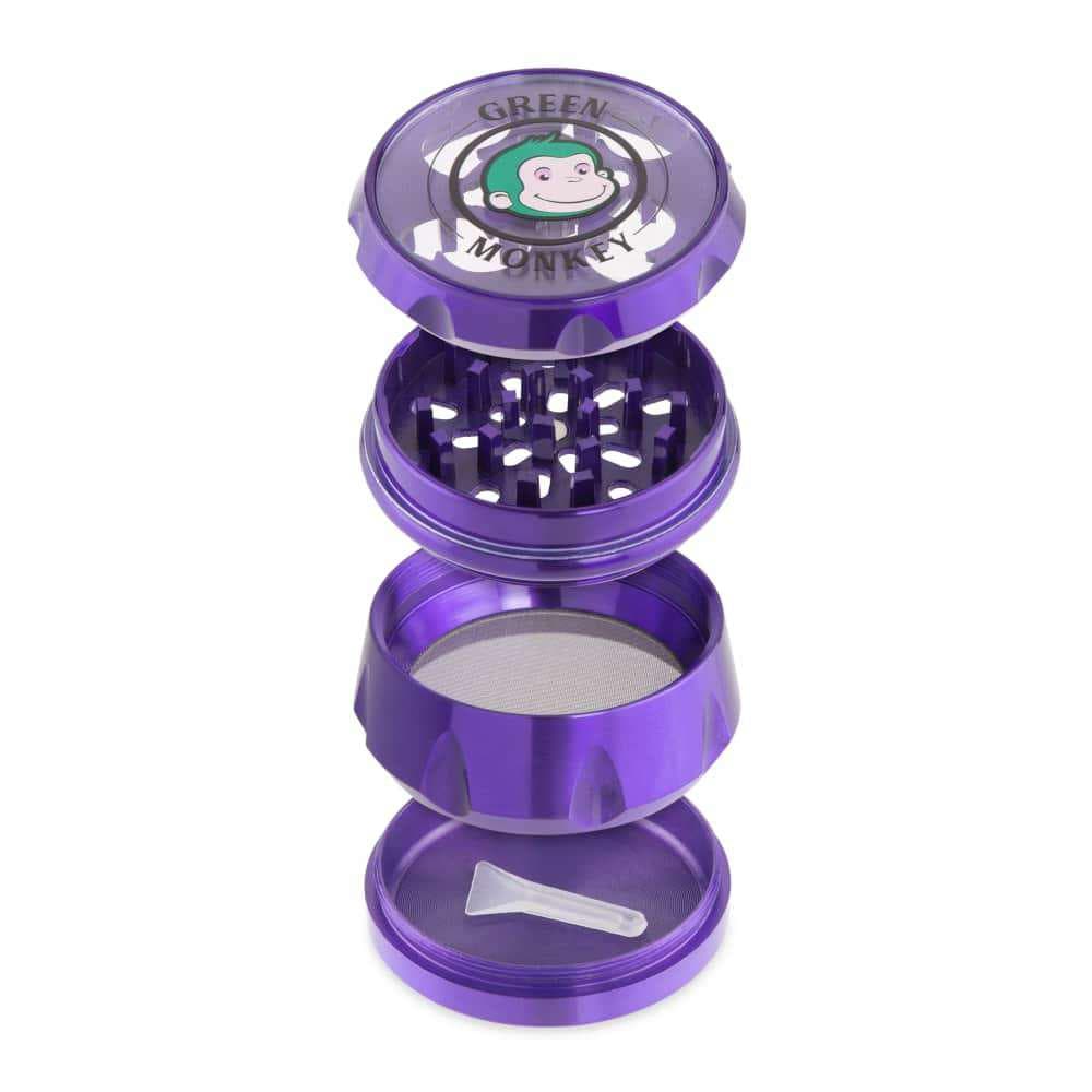 A studio shot of the disassembled Baboon Crown 63mm Grinder, showcasing its tiered, metallic purple construction.