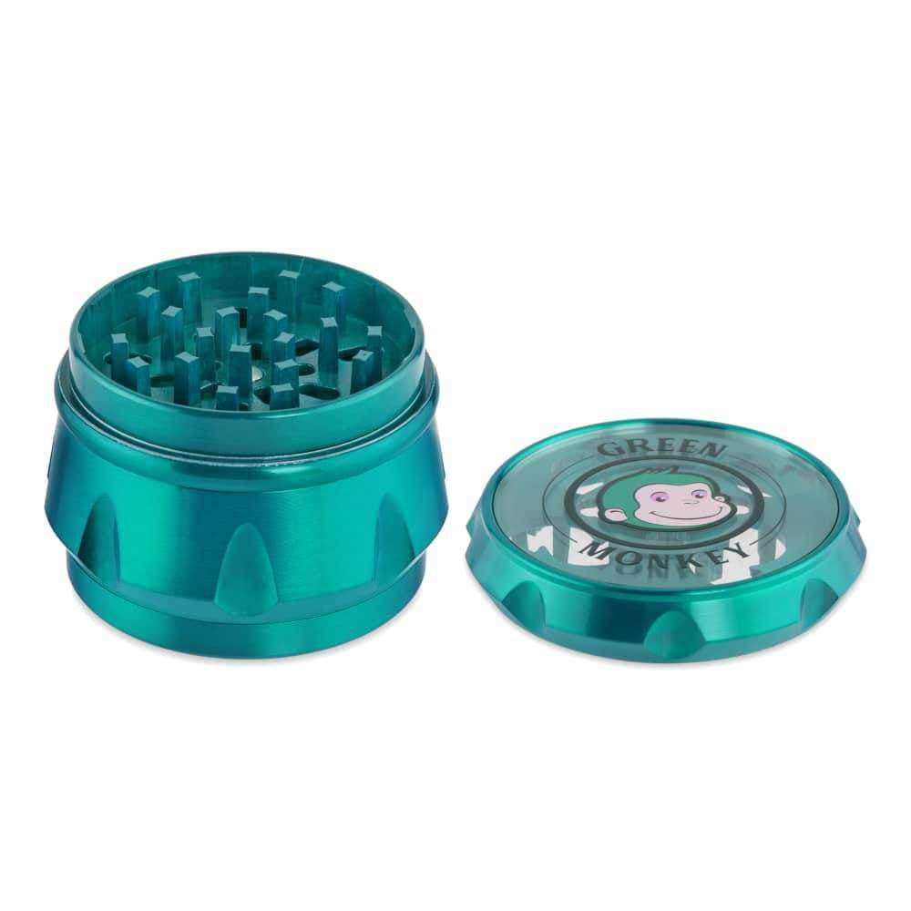 Front view of the Baboon Crown 63mm Grinder, showcasing its circular, multi-tiered metallic construction.