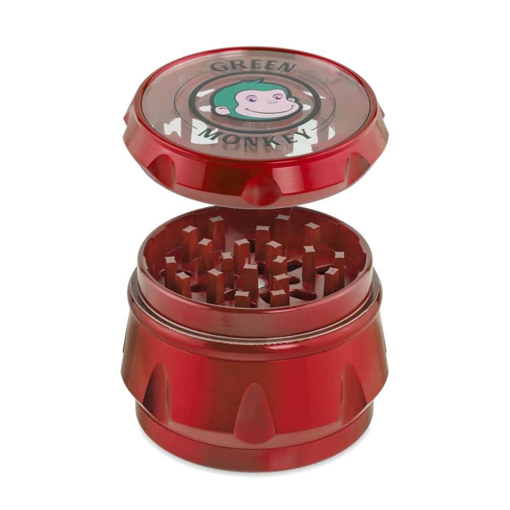 Close-up view of the Baboon Crown 63mm Grinder, showcasing its metal construction and circular, layered design.