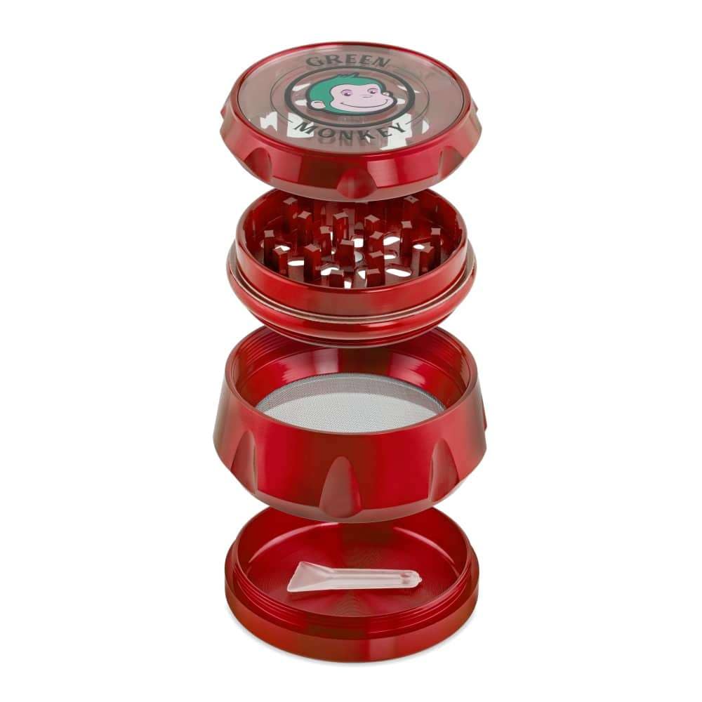 A straight-on view of the Baboon Crown 63mm Grinder, showcasing its sleek, red metallic design.