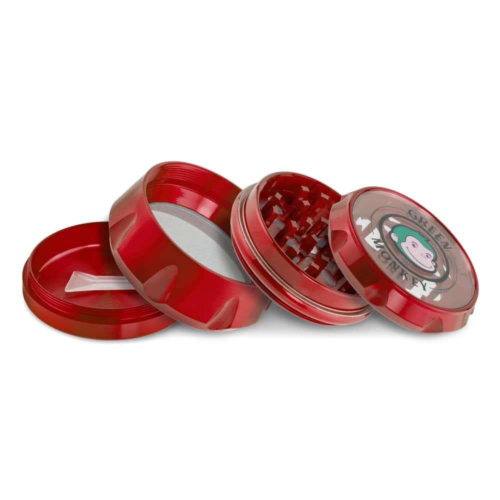 A top-down view of the disassembled Baboon Crown 63mm Grinder, showcasing its multi-tiered metal construction.