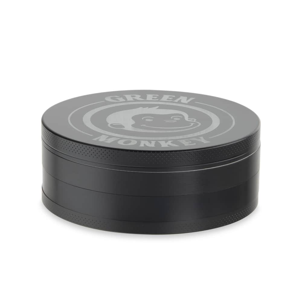 Front view of the Capuchin 100mm Grinder, a cylindrical, multi-part metal grinder with a dark finish.