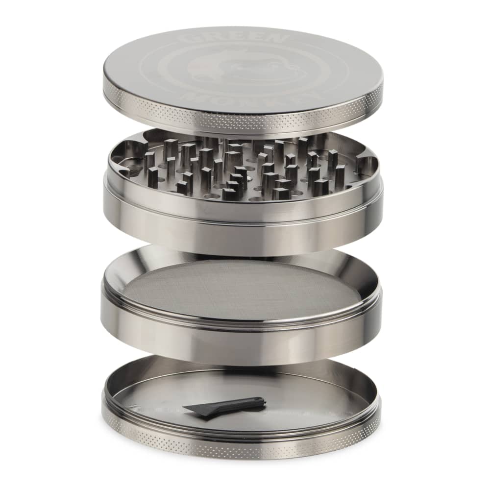 A disassembled view of the Capuchin 100mm Grinder, showing its stacked metal components against a plain white background.