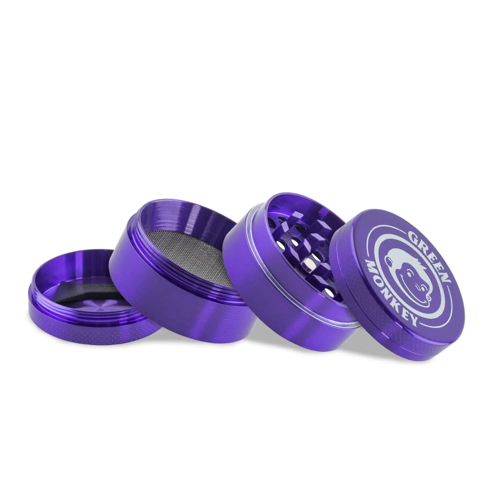 A top-down view of the disassembled Capuchin 40mm Grinder, showcasing its metallic purple components arranged in a circular pattern.