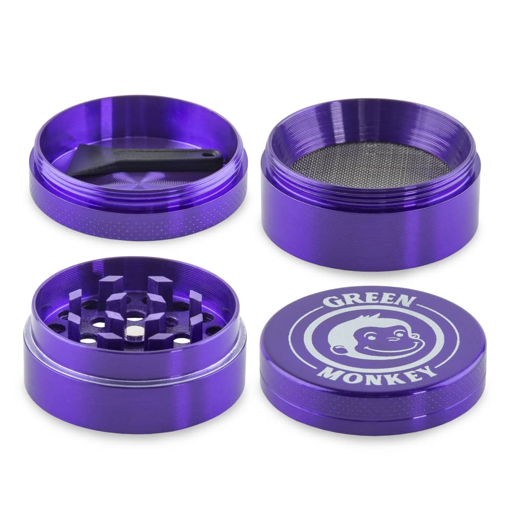 Close-up front view of the Capuchin 40mm Grinder, showcasing its metallic purple finish and inner grinding teeth.