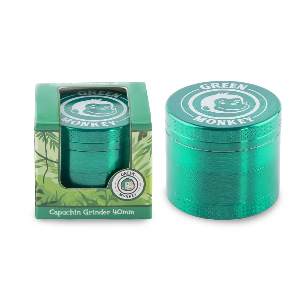 Front view of the Capuchin 40mm Grinder, a silver metal grinder with a branded design, against a dark background.