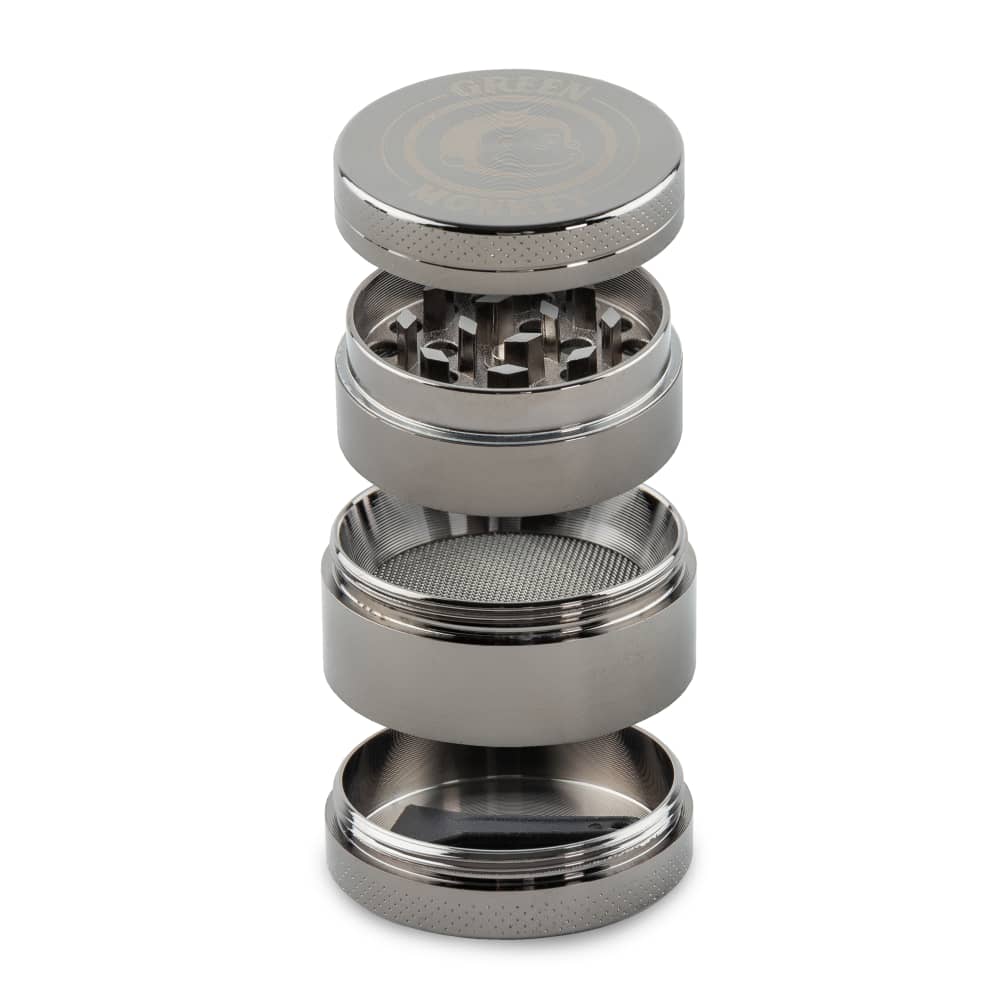 Close-up, angled view of the Capuchin 40mm Grinder, showcasing its metallic finish and multi-tiered construction.
