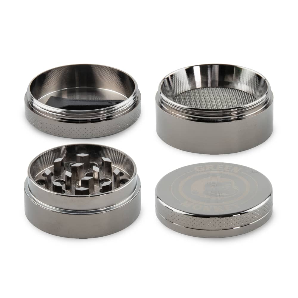 Close-up of the Capuchin 40mm Grinder, showing its circular metal design from a slightly elevated angle against a plain white background.