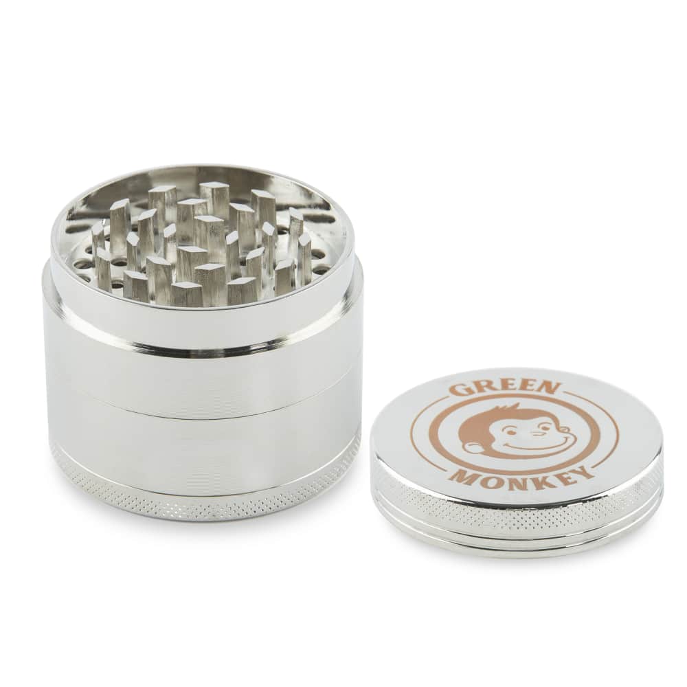 A close-up, angled view of the Capuchin 50mm Grinder, featuring a metallic finish and cylindrical shape.