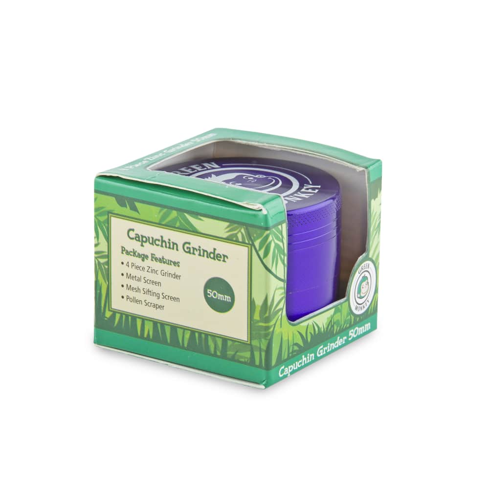 Front view of the Capuchin 50mm Grinder, a metallic, multi-tiered device with a textured surface, on a dark background.