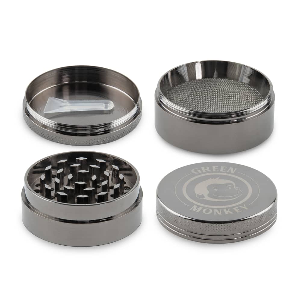 Close-up, top-down view of the Capuchin 50mm Grinder with a metallic finish and visible grinding teeth.