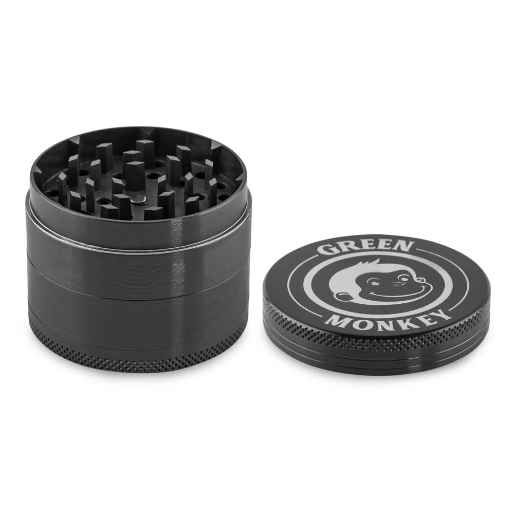 Close-up of the Capuchin 55mm Grinder, showing its cylindrical shape and metallic finish against a dark background.