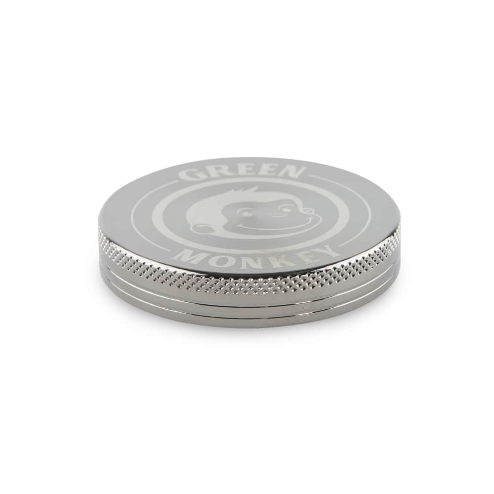Front view of the Capuchin 55mm Grinder, a silver metal grinder with a textured surface, presented on a plain white background.
