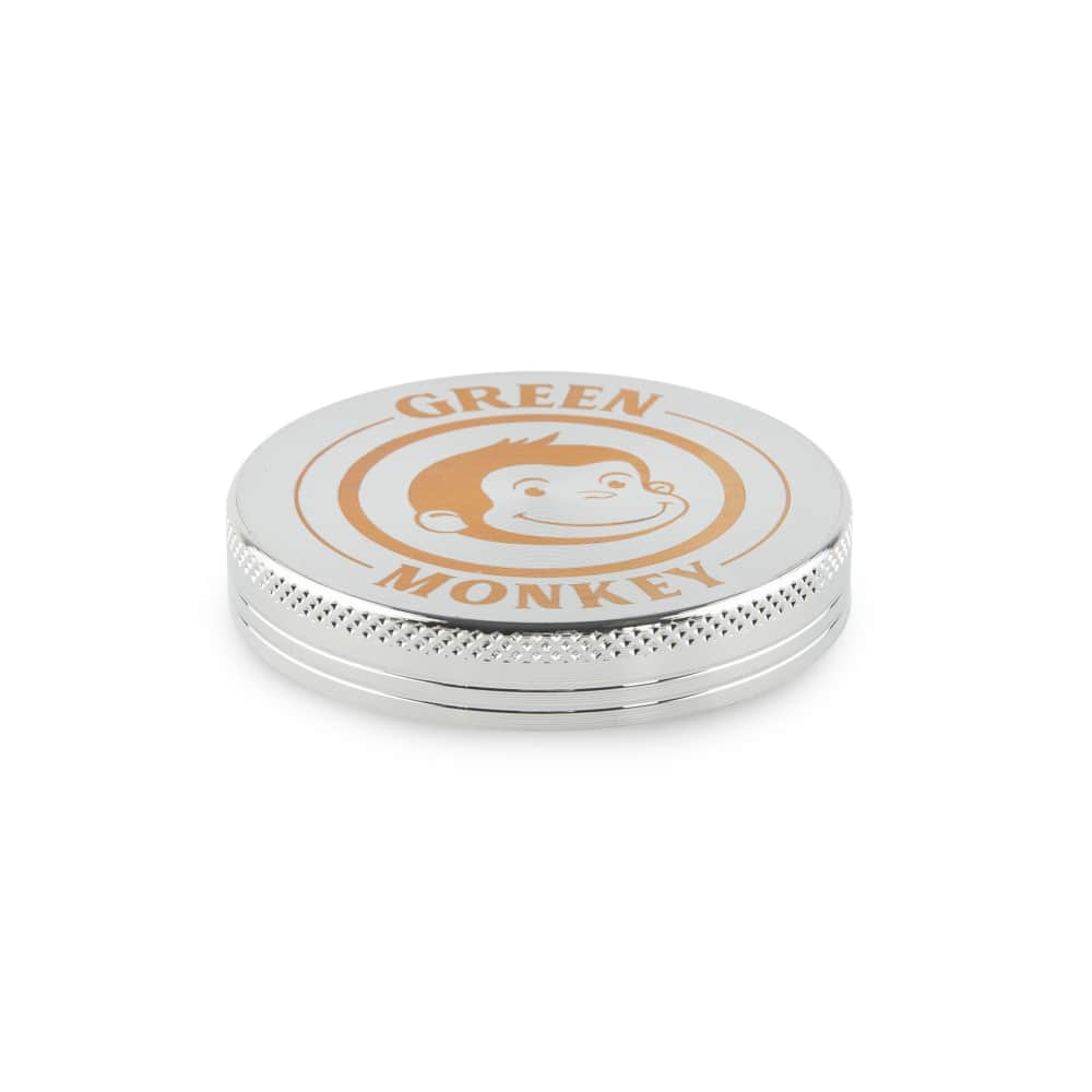 A close-up, top-down view of the Capuchin 55mm Grinder, showcasing its metallic, circular design.