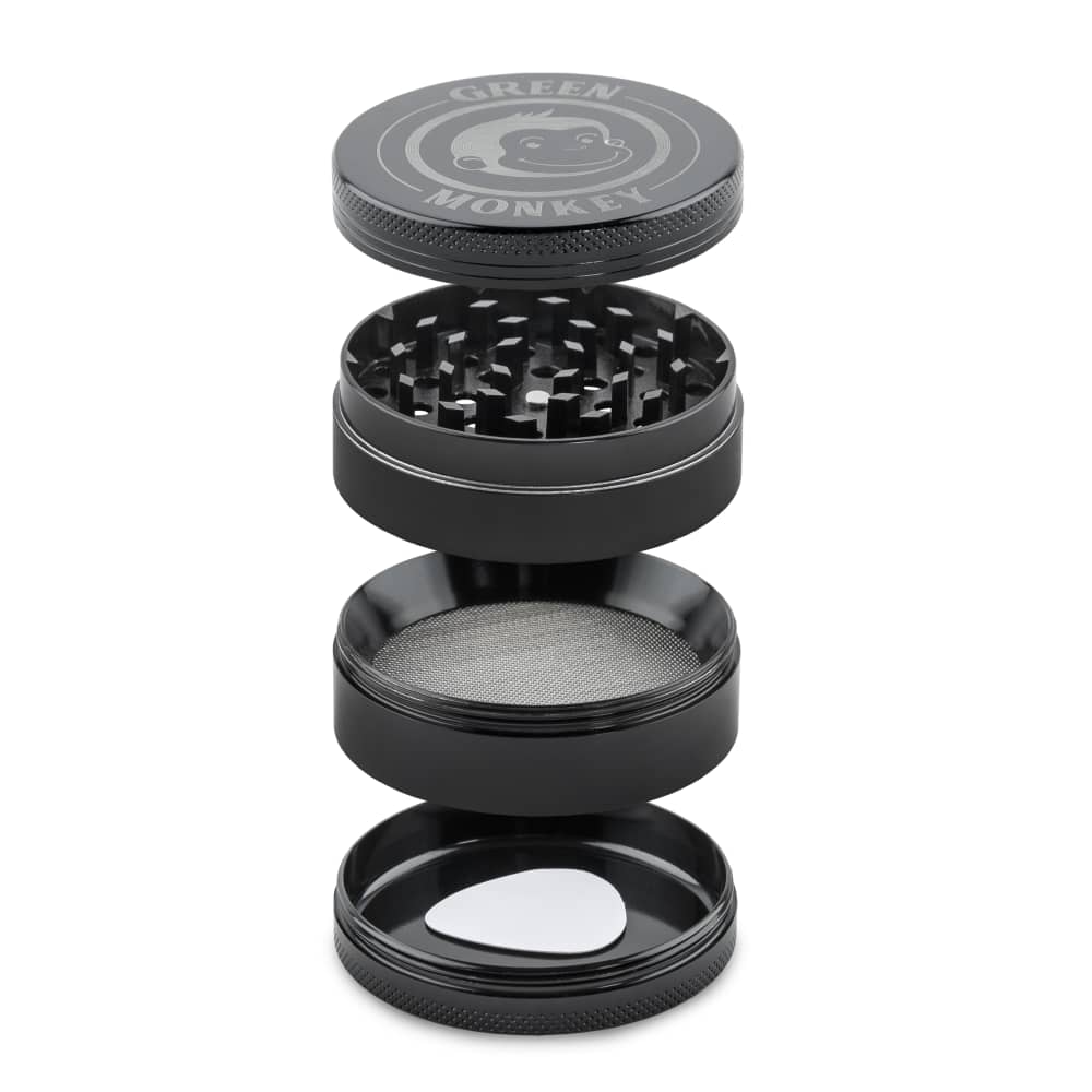 A studio shot of the disassembled Capuchin 63mm Grinder, showing its metallic components stacked neatly against a plain white background.