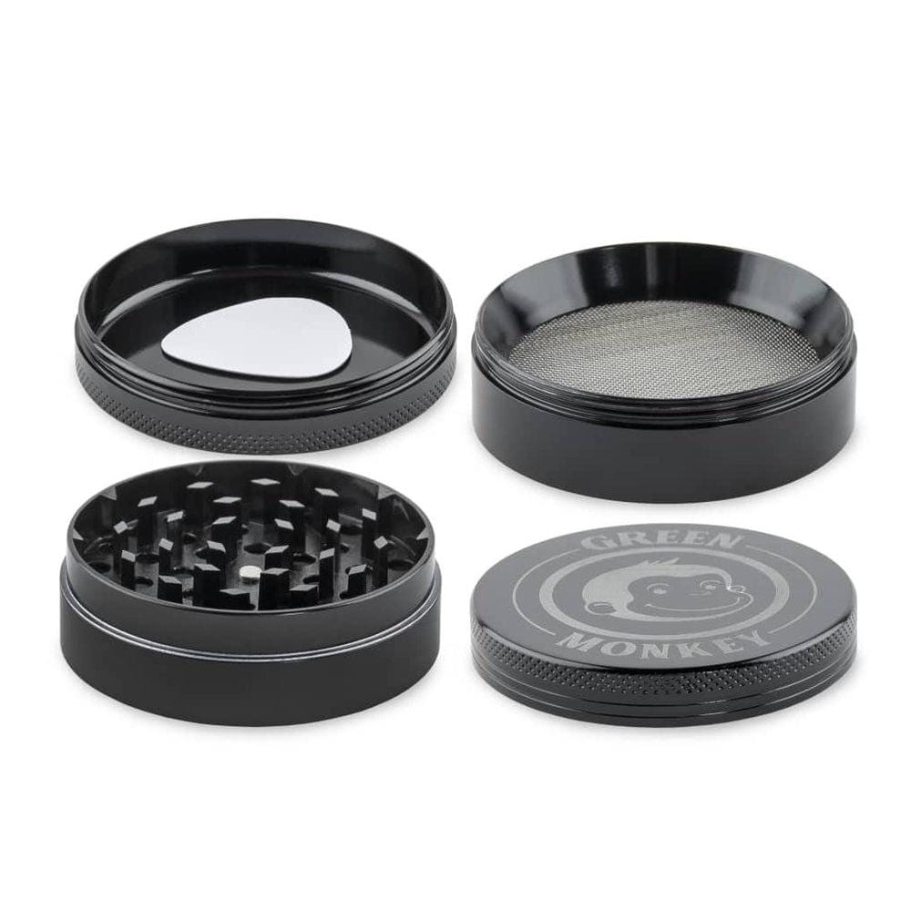 Top-down view of the Capuchin 63mm Grinder with its components neatly arranged on a stark white surface.
