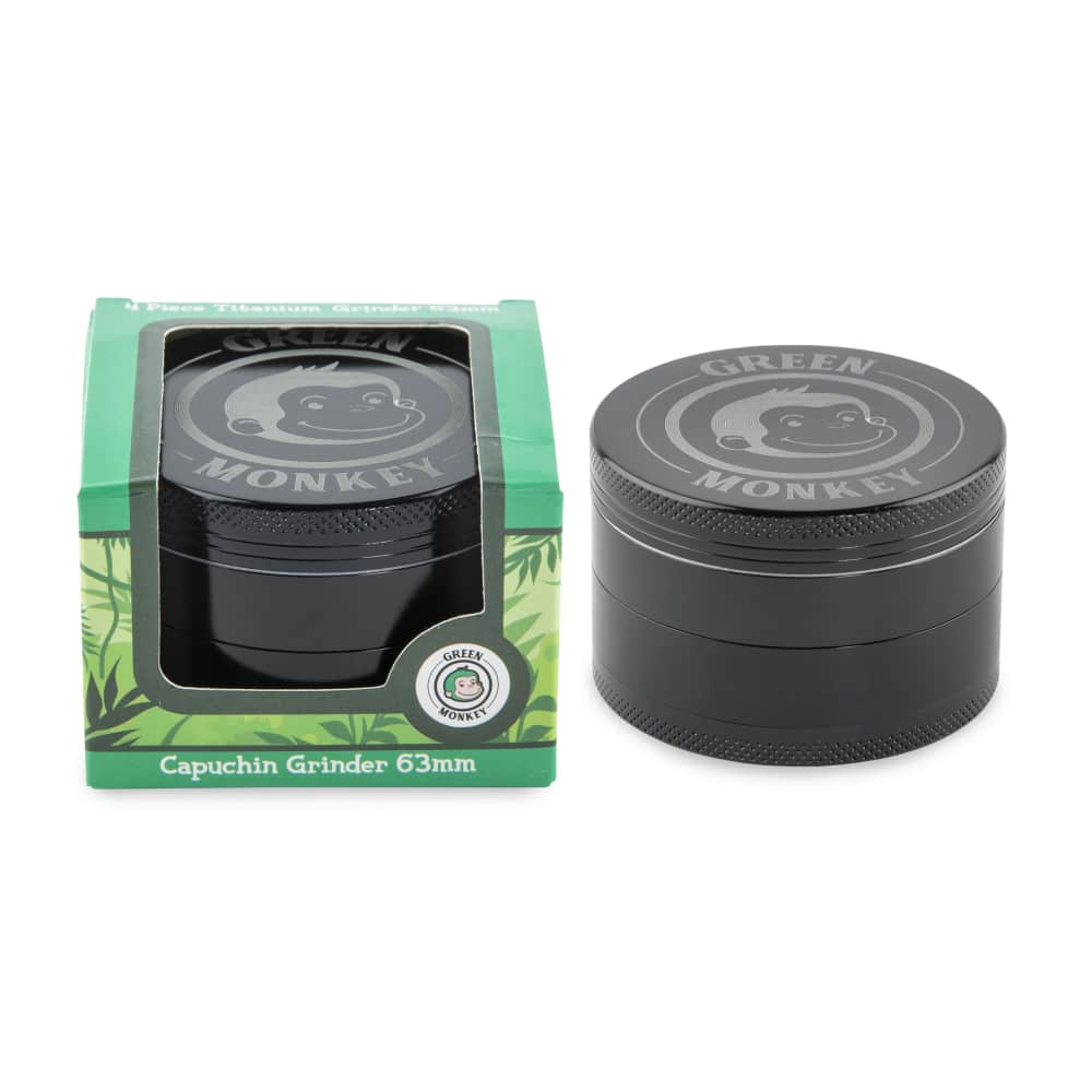 Front view of the Capuchin 63mm Grinder, a black metal grinder with a circular design and visible branding on the lid.