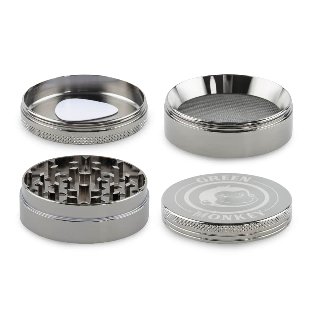 A top-down view of the Capuchin 63mm Grinder, showcasing its silver metallic finish and textured circular design.