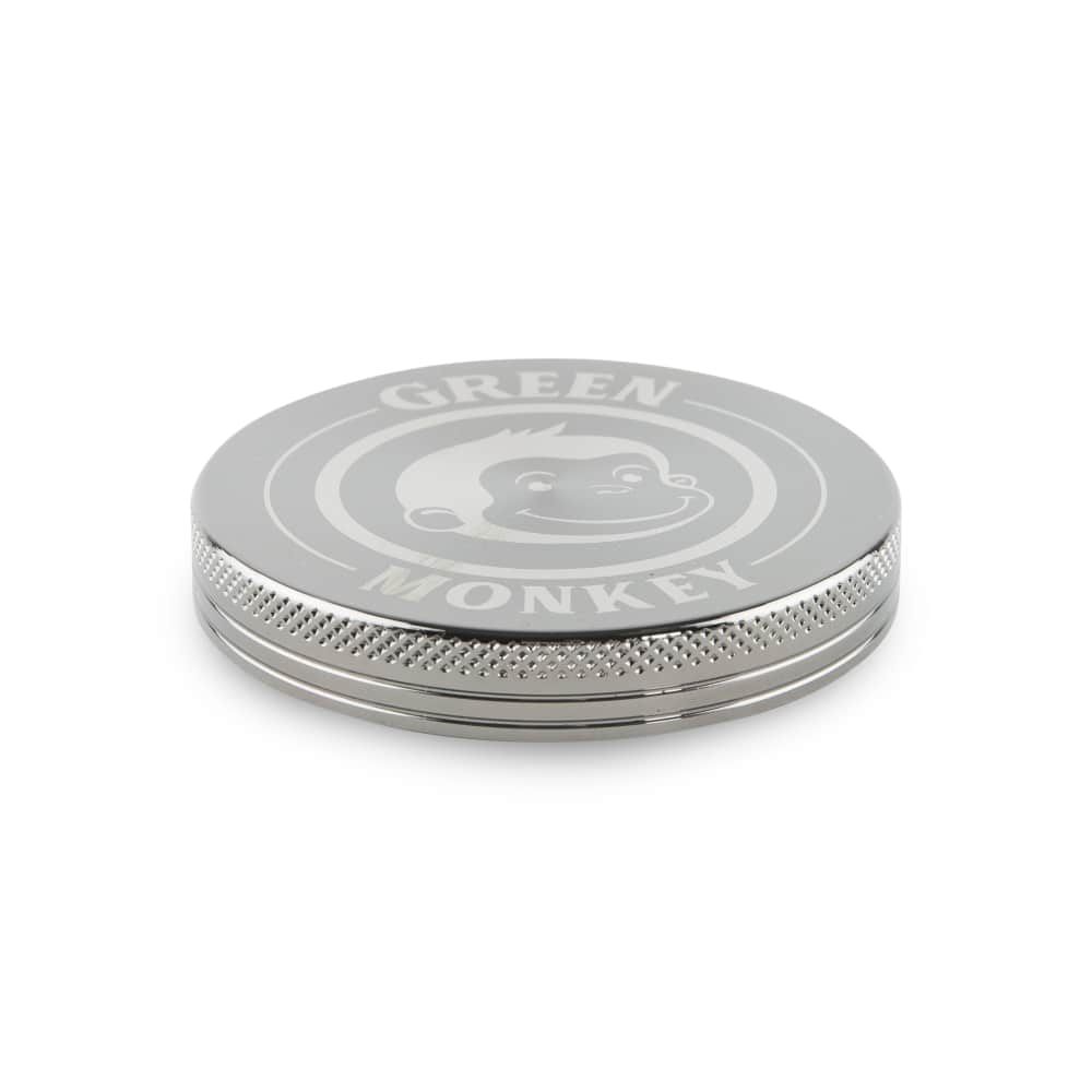 Top-down view of the Capuchin 63mm Grinder, showcasing its metallic finish and circular design against a plain white background.