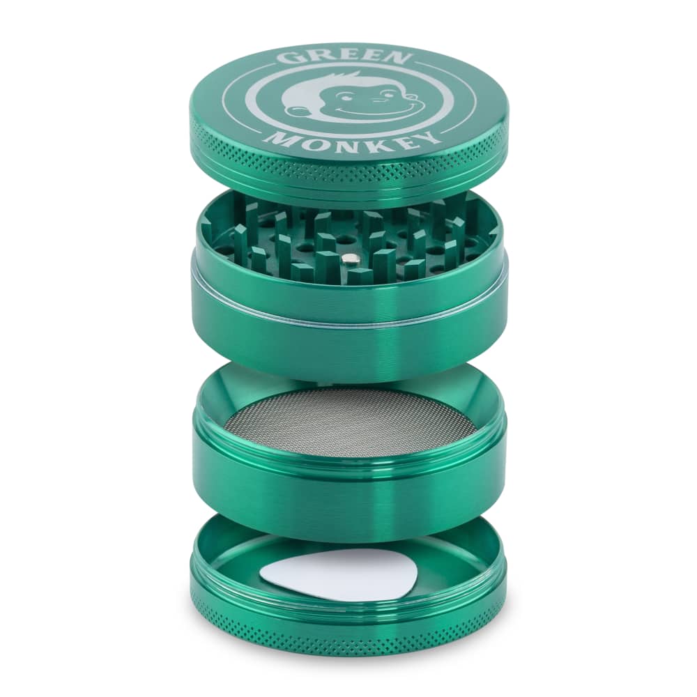A close-up, angled view of the Capuchin 63mm Grinder, showcasing its silver metallic finish and multi-tiered cylindrical design.